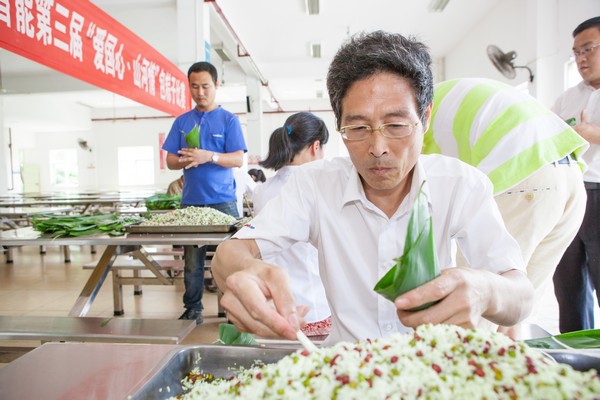 弘扬传统文化，共享浓情端午——记第三届“爱国心·不朽情缘-官方网站情”包粽子角逐